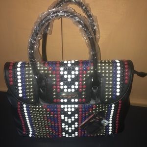 Black purse with blue , red, white studs